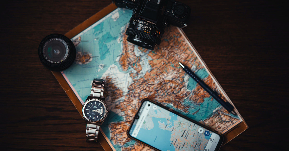 Map, camera and watch